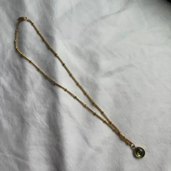 Gold eye necklace with green - Picture 2 of 3